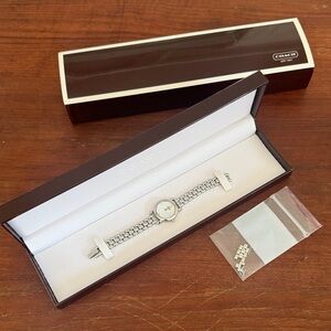 Coach Silver Bracelet Watch with mother of pearl face (needs new battery)